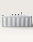 Front view of the Bellastone Kolpa back-to wall bath with black tap ware in white