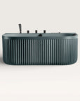 Front view of the Bellastone DORIA Spa Bath in blue-grey with black tap ware