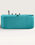 Front view of the Bellastone DORIA Spa Bath in celadon-blue with black tap ware