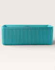 Front view of the Bellastone KOLPA Back-to-Wall Bath in celadon blue