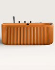 Front view of the Bellastone DORIA Spa Bath in orange with black tap ware