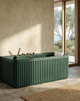 Kolpa back to wall bath with faucet