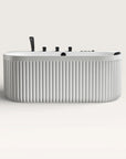 Front view of the Bellastone DORIA Spa Bath in white with black tap ware