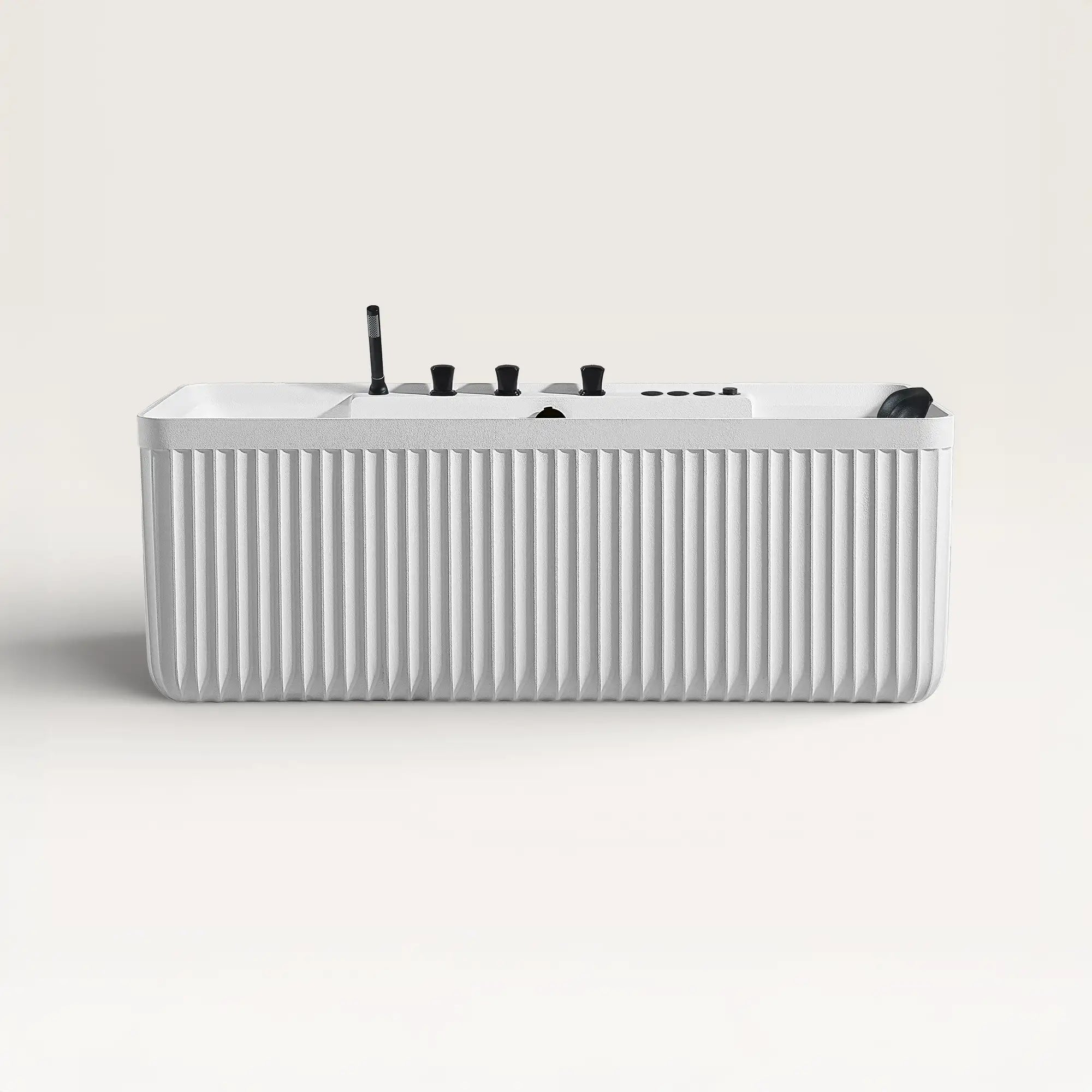 Front view of the Bellastone Kolpa Spa bath with black tap ware in white