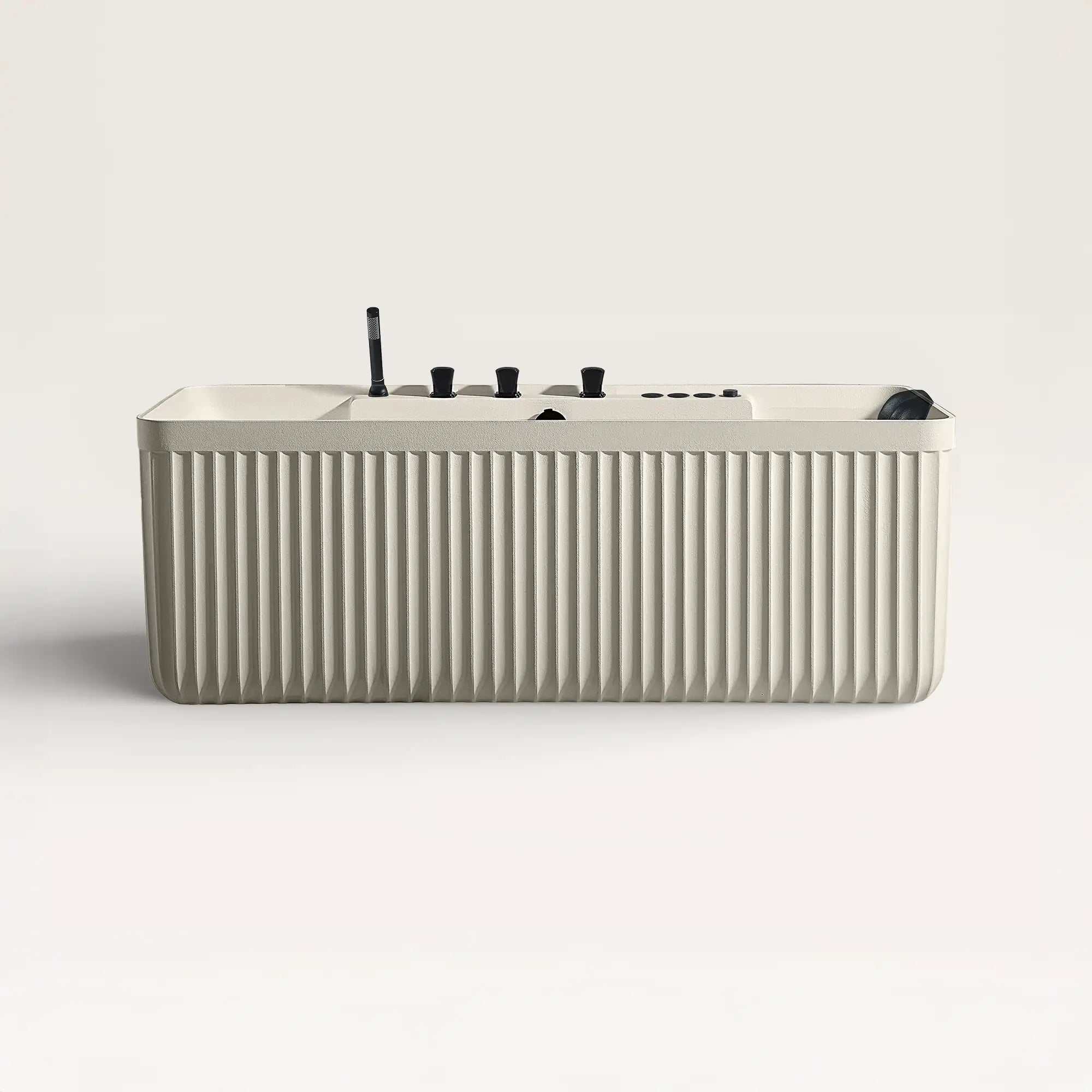 Front view of the Bellastone Kolpa Spa bath with black tap ware in cream