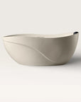 Front view of the Bellastone Soma freestanding bath in cream with a black magnetic pillow