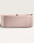 Front view of the Bellastone DORIA Back-to-wall Bath in pink