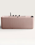 Front view of the Bellastone Kolpa Spa bath with black tap ware in pink