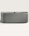Front view of the Bellastone DORIA Back-to-wall Bath in cement-grey