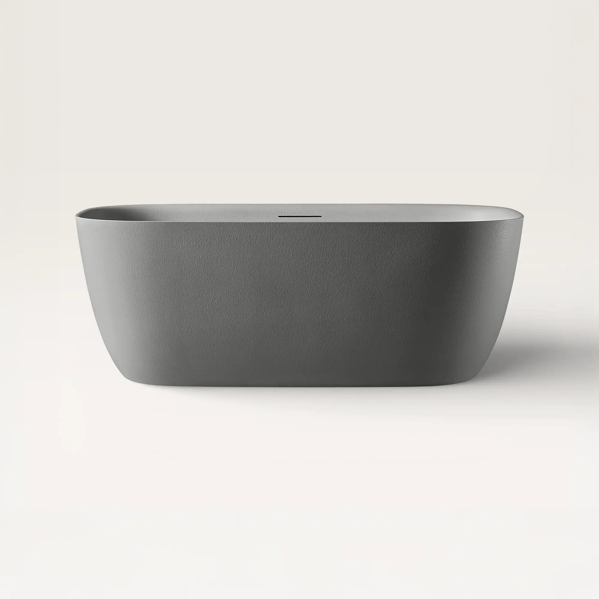 Front view of the Bellastone Linea freestanding bath in cement-grey