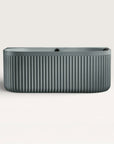 Front view of the Bellastone DORIA Back-to-wall Bath in blue-grey