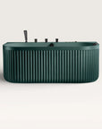 Front view of the Bellastone DORIA Spa Bath in green with black tap ware