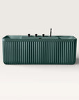 Front view of the Bellastone Kolpa back-to wall bath with black tap ware in green