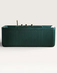 Front view of the Bellastone Kolpa Spa bath with gold tap ware in green