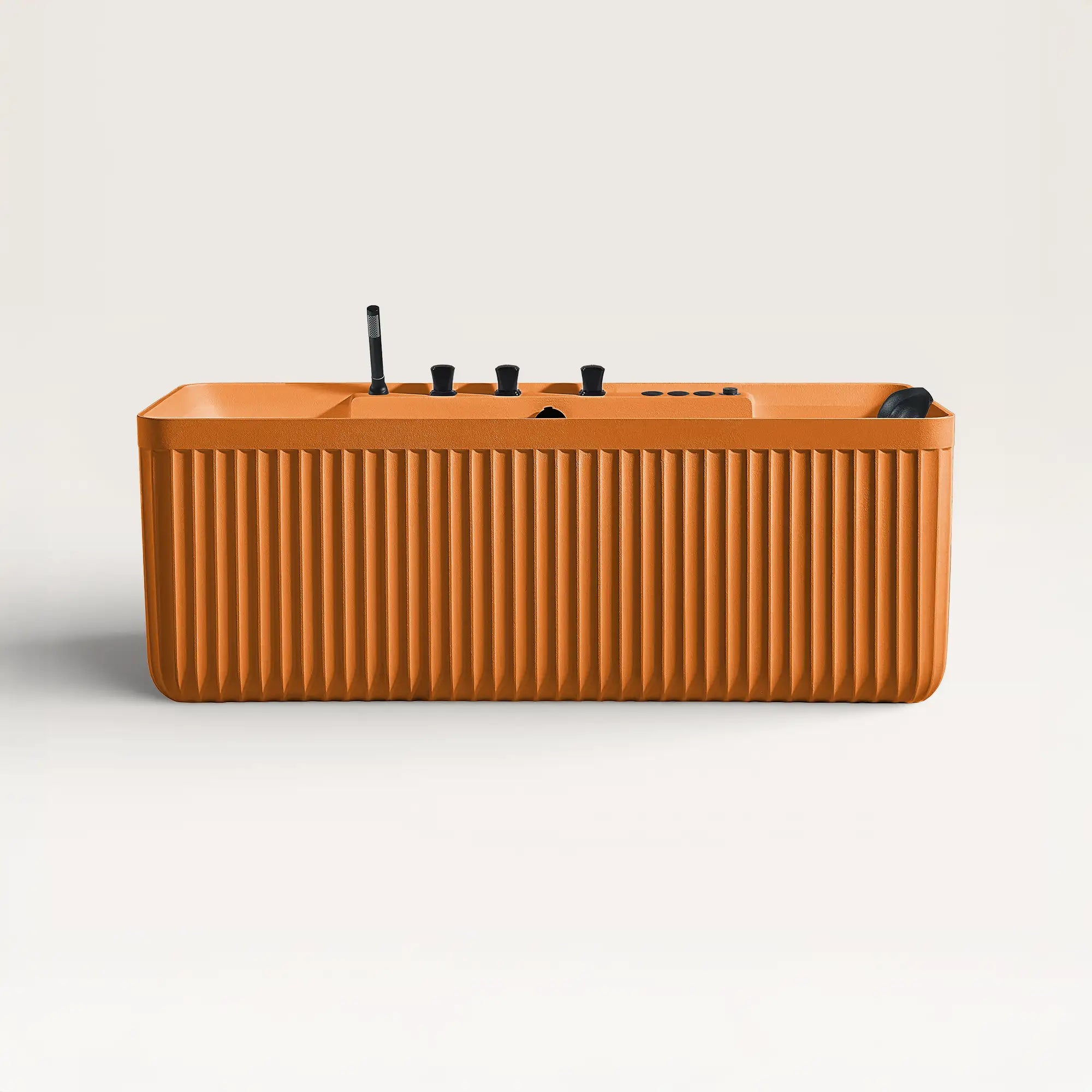 Front view of the Bellastone Kolpa Spa bath with black tap ware in orange
