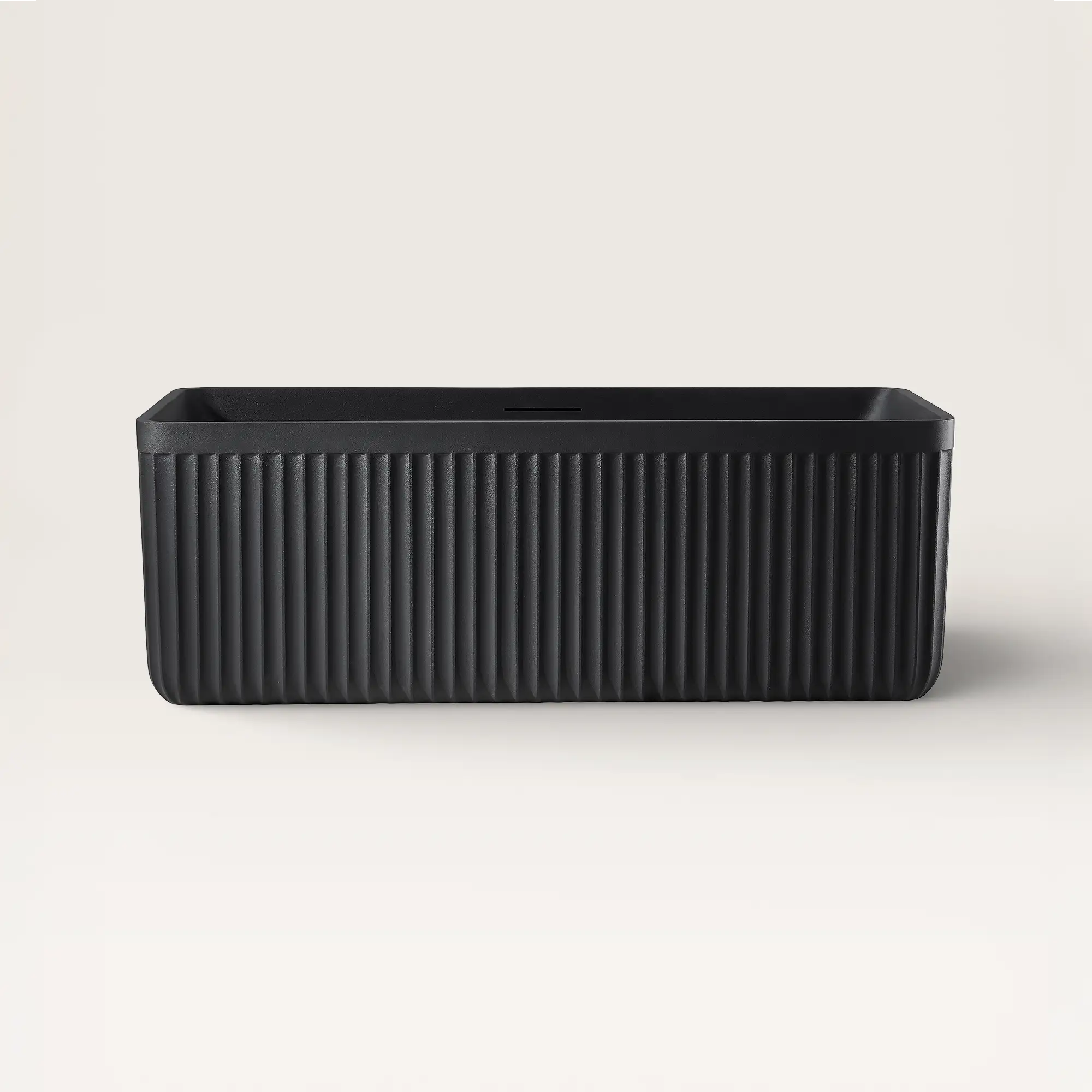 Front view of the Bellastone KOLPA Back-to-Wall Bath in black