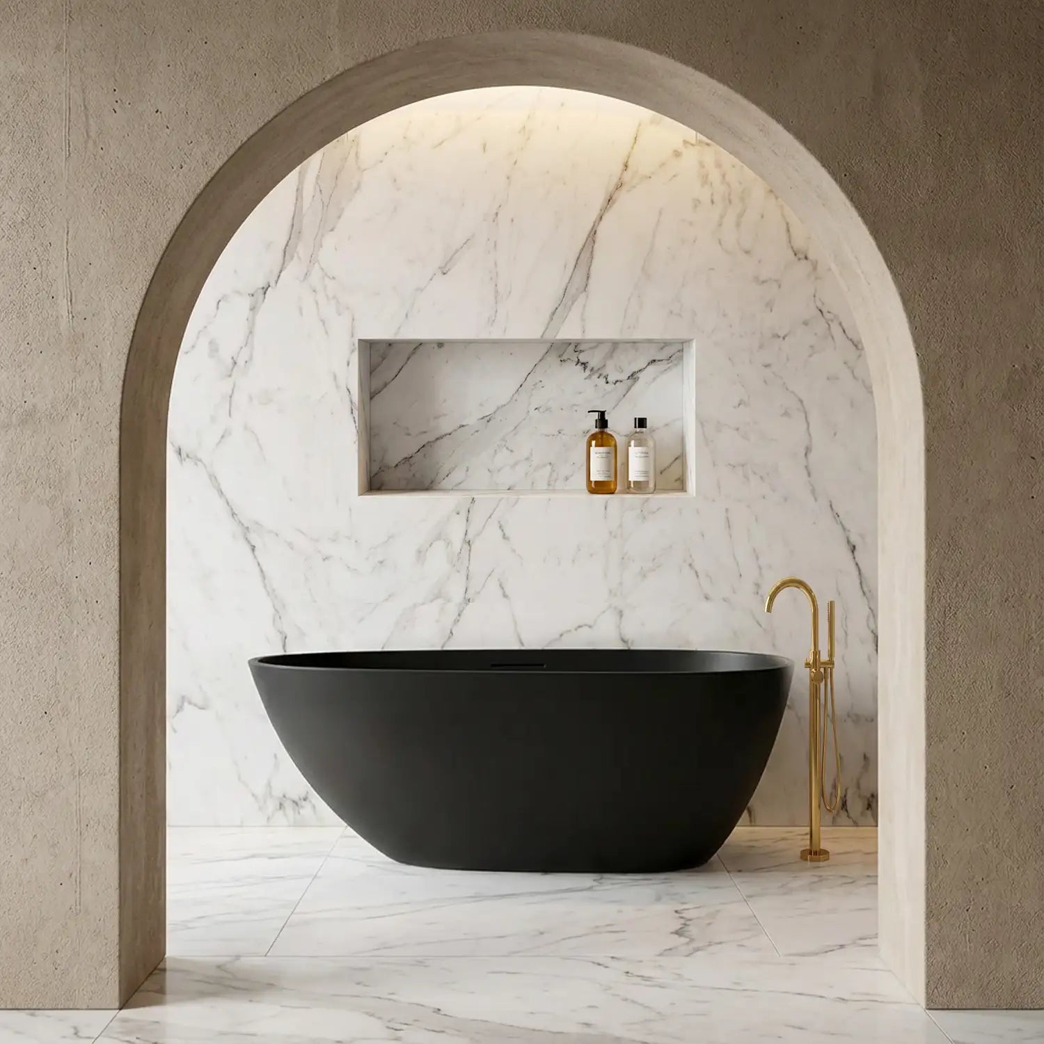 Modern bathroom with the Bellastone ARIA 1700mm freestanding bathtub in black, marble walls, and gold fixtures. 