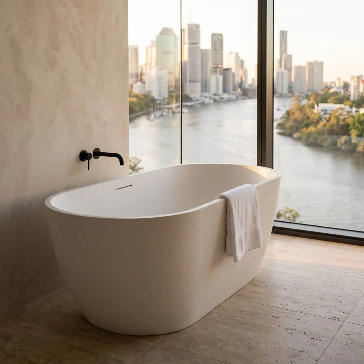 Freestanding bellastone mineral composite bath in Cream.