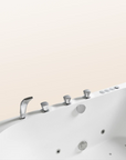 A top view of the Bellastone Doria spa bathtub in white with silver tap ware, on a beige background